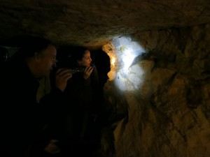 looking at rocks in a cave